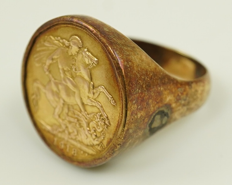 A George V 1918 gold sovereign, in a 9ct gold ring mount